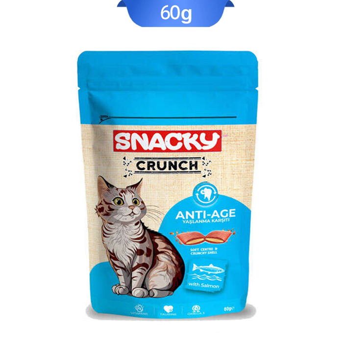 snacky-crunch-anti-age تشویقی گربه کرانچی اسنکی جلوگیری از پیری زودرس طعم سالمون وزن 60 گرم که بسته بندی آن کرم آبی و تصویر گربه روی آن است.