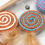 اسباب بازی گربه میله ای مدل آبنبات زنگوله دار کد 106309 - Image 2